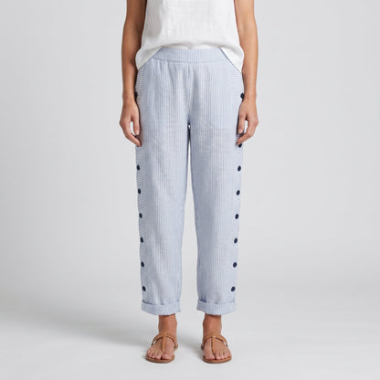 Pantalón de mujer a rayas con botones en contraste - Chic y fluido